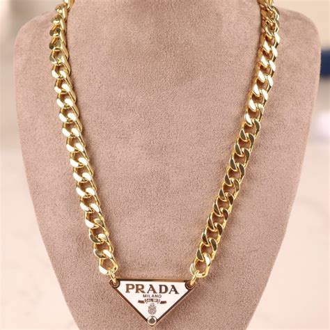 prada logo triangle necklace|gold prada necklace dupe.